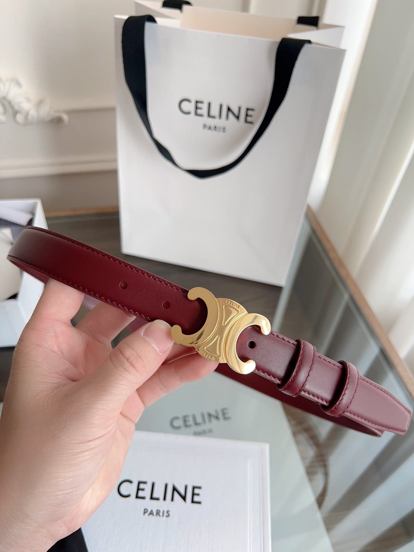 TRIOMPHE BELT 24MM IN WINE RED CALFSKIN WITH GOLD BUCKLE