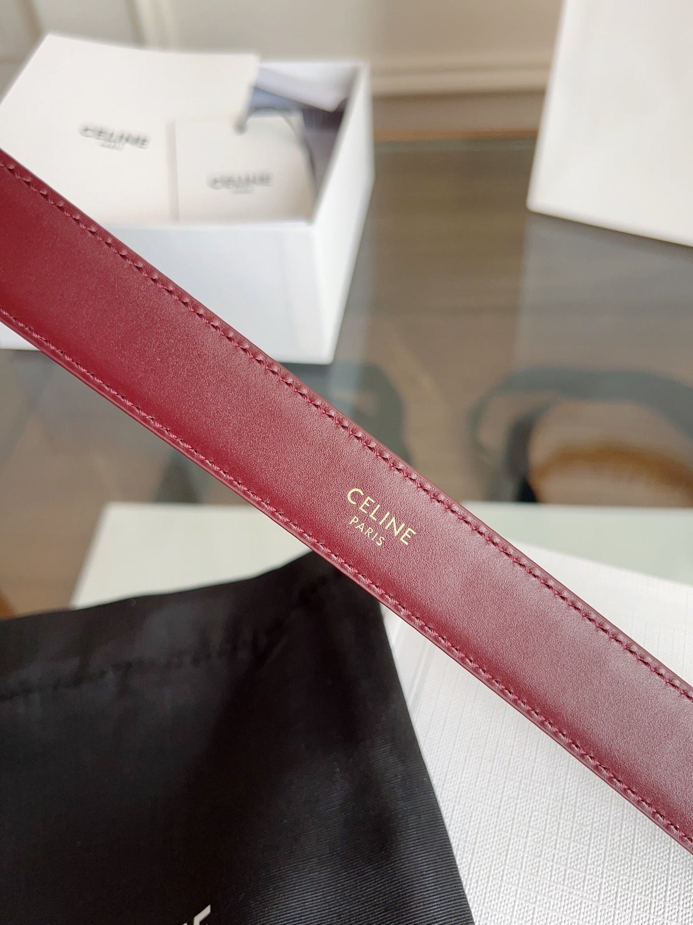 TRIOMPHE BELT 24MM IN WINE RED CALFSKIN WITH GOLD BUCKLE