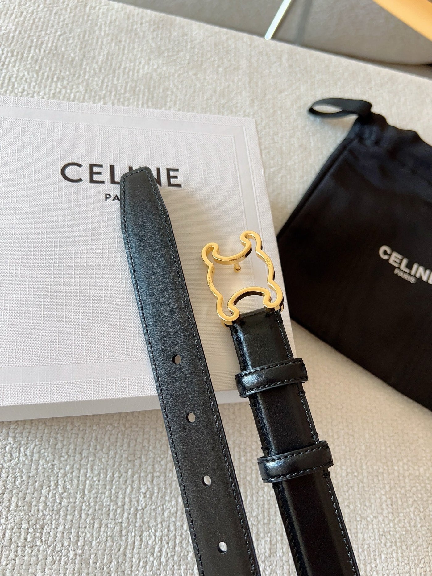BELT 25MM TRIOMPHE LOGO CUT-OUT IN SMOOTH BLACK CALFSKIN WITH GOLD BUCKLE