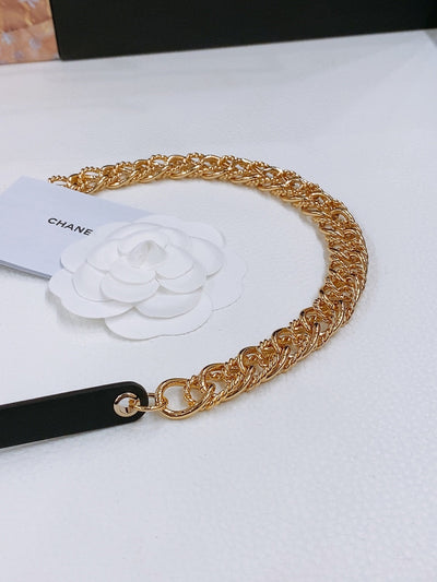 TWISTED GOLD CHAIN BELT IN GOLD METAL BLACK CALFSKIN GOLD BUCKLE